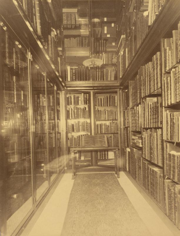 Vintage photograph of Pierpont Morgan's vault showing books on shelves.