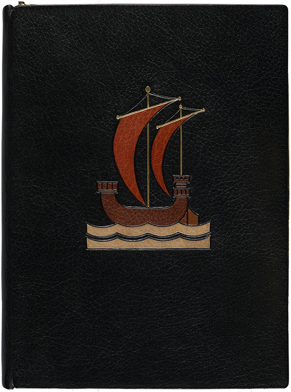 A closed book with a black full leather binding with gold tooling and a ship design inlaid in the center. The body of the ship is brown with red sails and gold masts. The ship sits on two light tan waves. Only the front cover is visible.