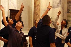 Students viewing ceiling art