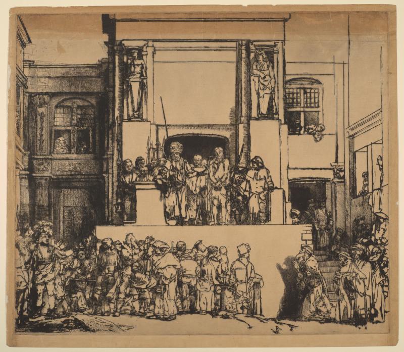 Figures standing on platform behind more figures in foreground.