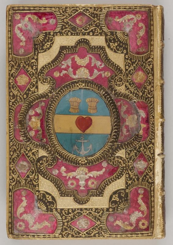 Decorated book binding in gold, blue, pink and black patterns with wheat sheafs and anchor in middle.