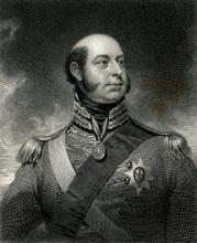 An engraving of Prince Edward, Duke of Kent and Strathearn, shown from the chest up, looking right. He has a bald head with prominent sideburns and wears a military uniform with epaulets, a sash, and several medals.