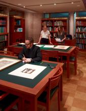 Reseachers sitting at tables in Drawing Sturdy Center