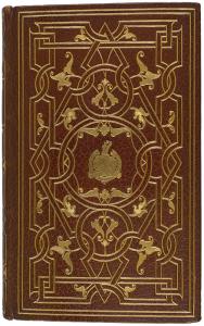 A closed book with a full brown morroco leather binding and gold tooling. Only the front cover is visible. The design of the gold tooling creates a large diamond shape interlinked with circular and chain like designs, with some leaves throughout, and a crest in the center.