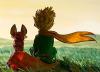 Figure of Little Prince seen from behind sitting next to fox with yellow scarf blowing to right with landscape in the background.