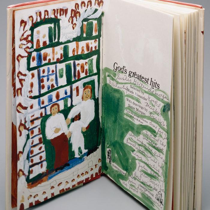 An open sketchbook with a drawing of a man, woman, and child sitting on a green couch on the left and text that says Good's Greatest Hoys on the right.